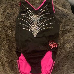 Gymnastics and dance leotard. Nastia liukin black and pink leotard